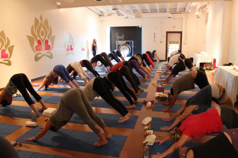 downward facing dog in yoga class