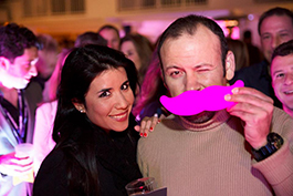 couple with lyft mustache at brand activation