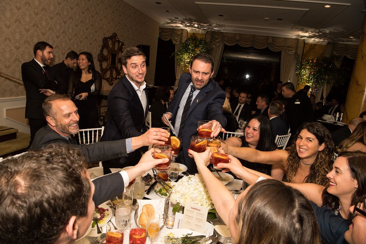 grand marnier teams toasting at experiential activation