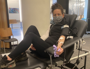 marcy karpowitz giving blood at american red cross blood drive